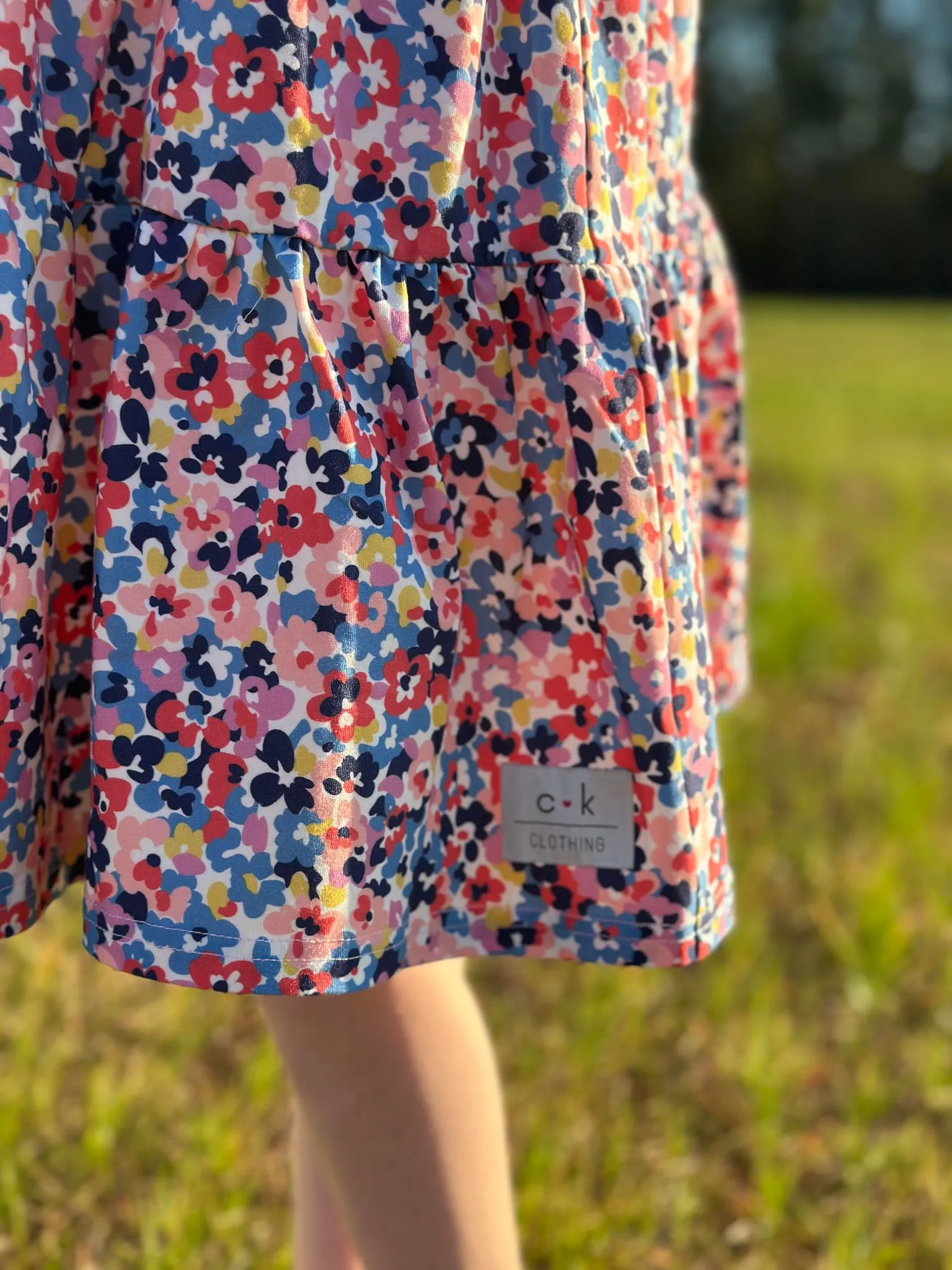 PETAL PATCH KNIT TWIRL DRESS