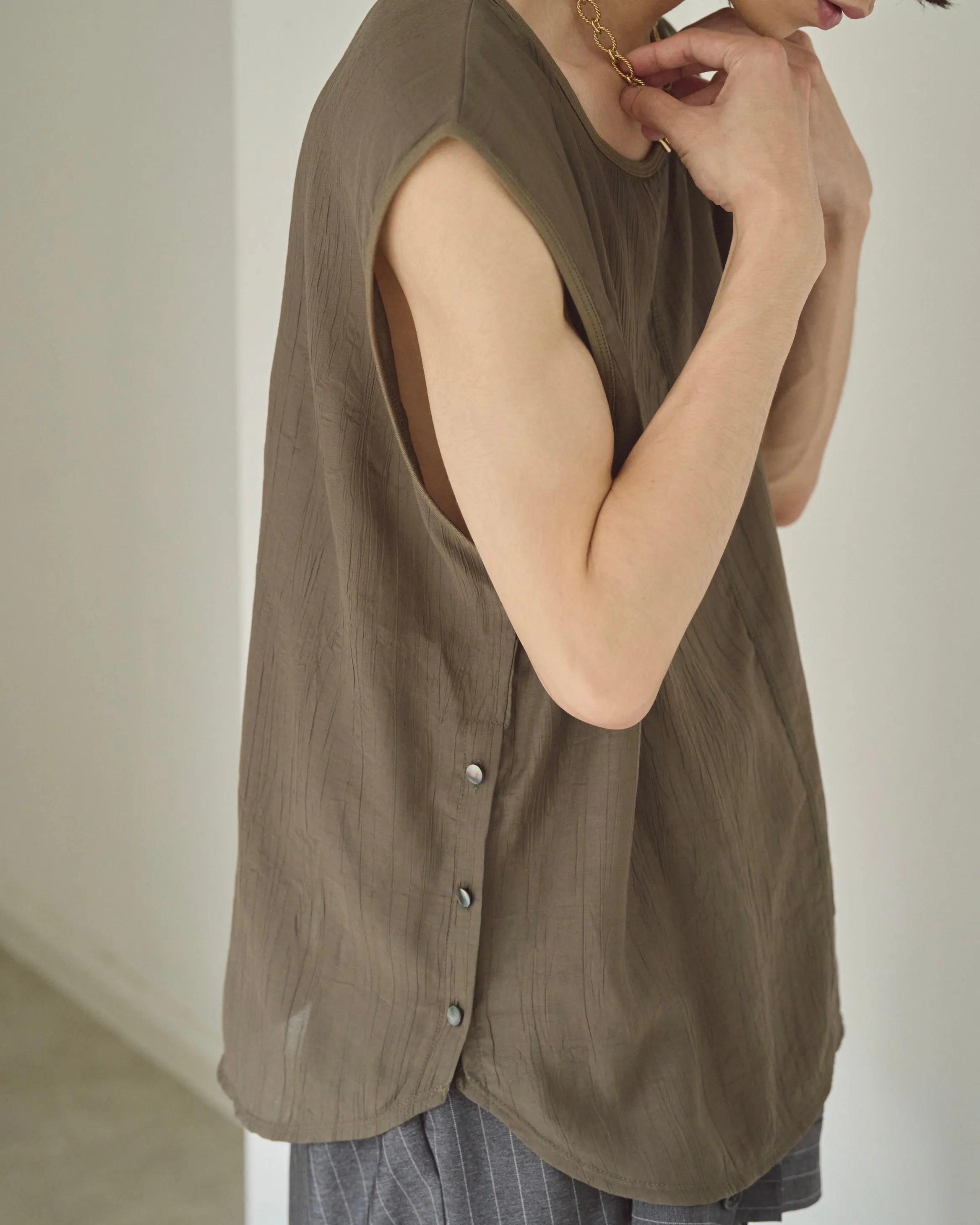 sleeve less semi-sheer tops